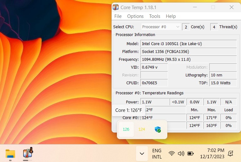 CPU core temperatures displayed on Windows 11 system tray using Core Temp app.